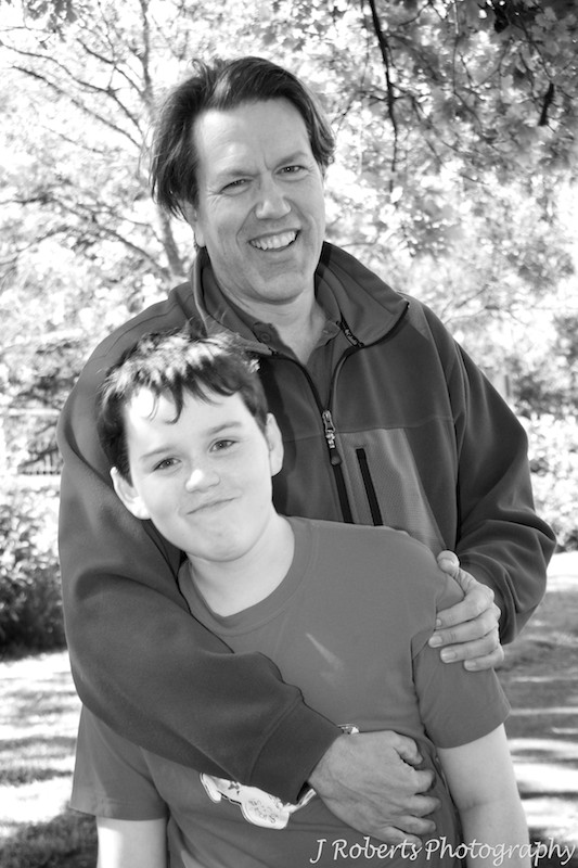 Father and son laughing - family portrait photography